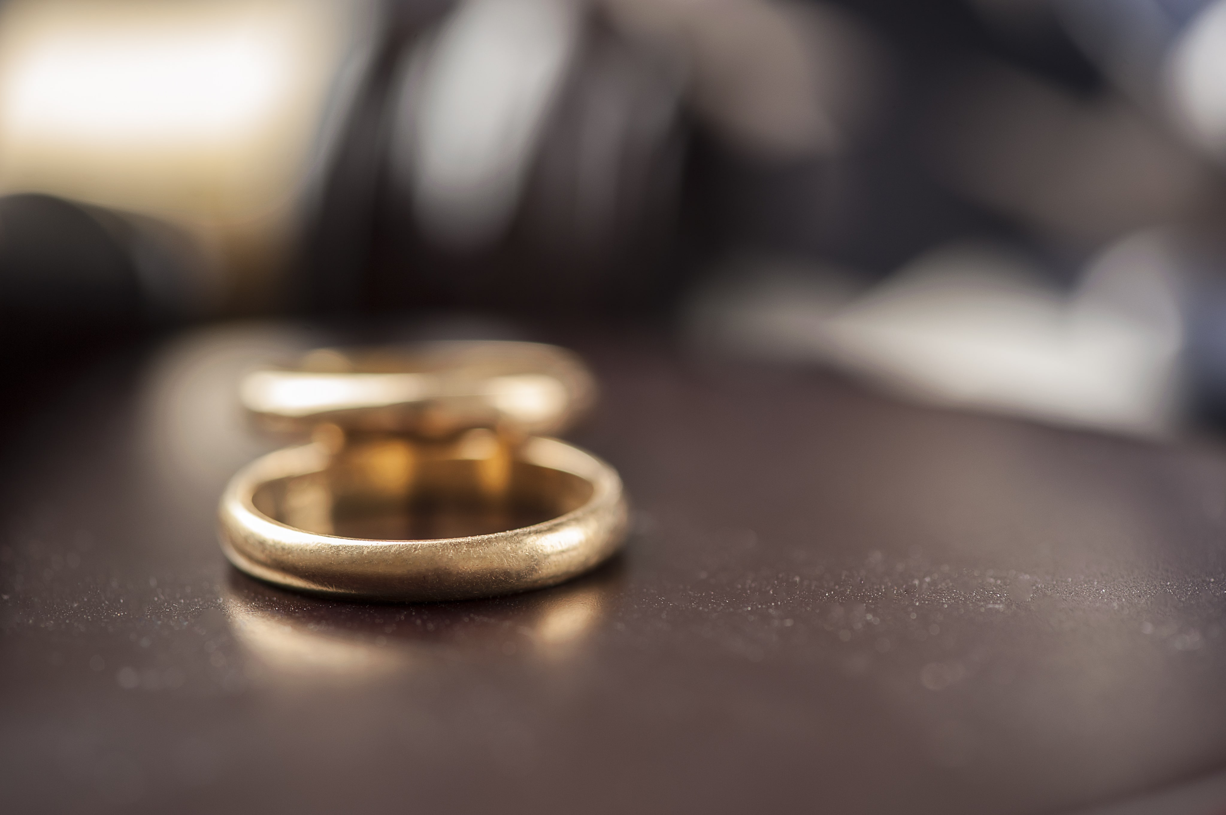 wedding bands on the table in divorce